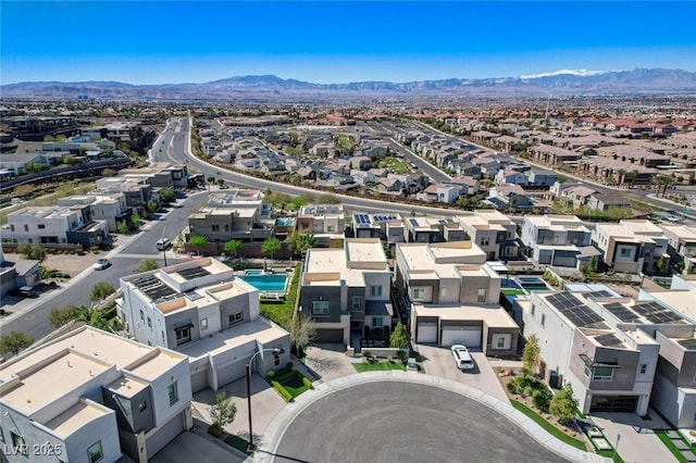 bird's eye view with a residential view and a mountain view