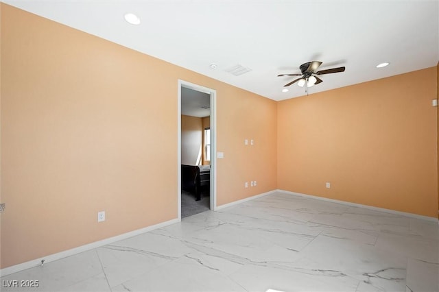 unfurnished room featuring baseboards, recessed lighting, marble finish floor, and ceiling fan