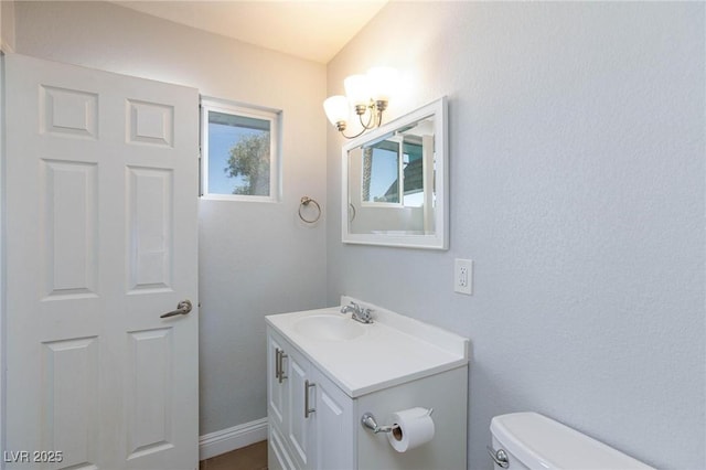 half bath with toilet and vanity