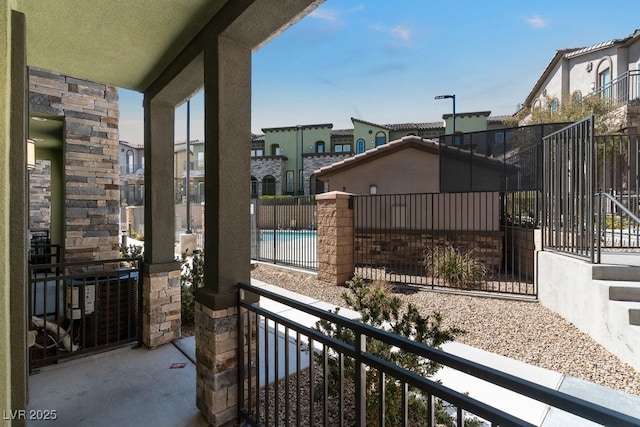 balcony with view of pool area