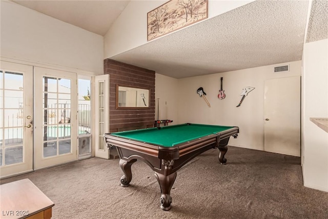 recreation room featuring carpet floors, pool table, a textured ceiling, and visible vents
