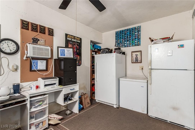interior space with ceiling fan and carpet
