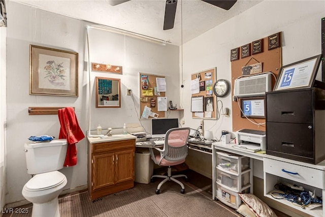 office area featuring carpet flooring and a ceiling fan