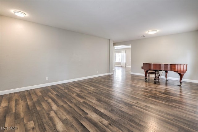 260 Pioneers Peak, Henderson, NV 89002 - unfurnished room with visible vents, baseboards, and dark wood-style floors