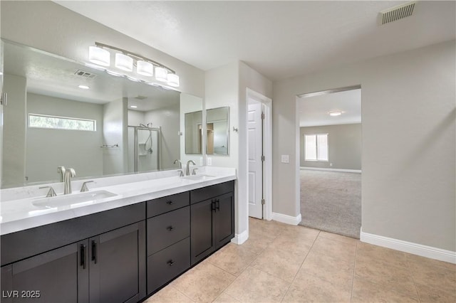 260 Pioneers Peak, Henderson, NV 89002 - full bathroom featuring tile patterned floors, baseboards, a stall shower, and a sink