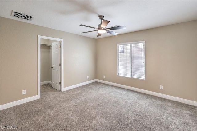 260 Pioneers Peak, Henderson, NV 89002 - unfurnished bedroom with a spacious closet, visible vents, baseboards, and carpet floors