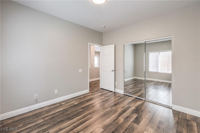 260 Pioneers Peak, Henderson, NV 89002 - unfurnished bedroom with a closet, baseboards, and wood finished floors