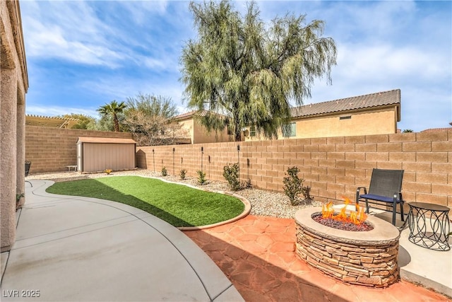 260 Pioneers Peak, Henderson, NV 89002 - view of patio featuring an outdoor fire pit, a shed, an outdoor structure, and a fenced backyard