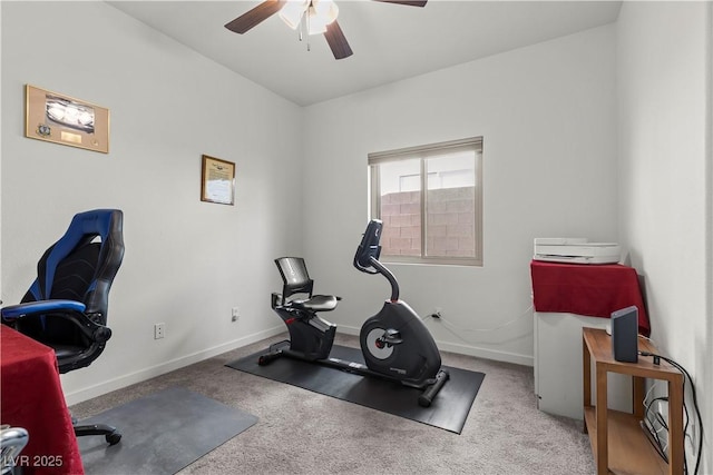 workout room featuring baseboards, ceiling fan, and carpet