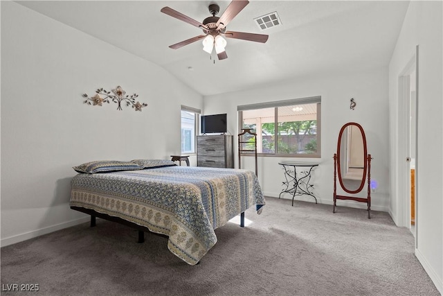 bedroom with baseboards, carpet floors, visible vents, and vaulted ceiling