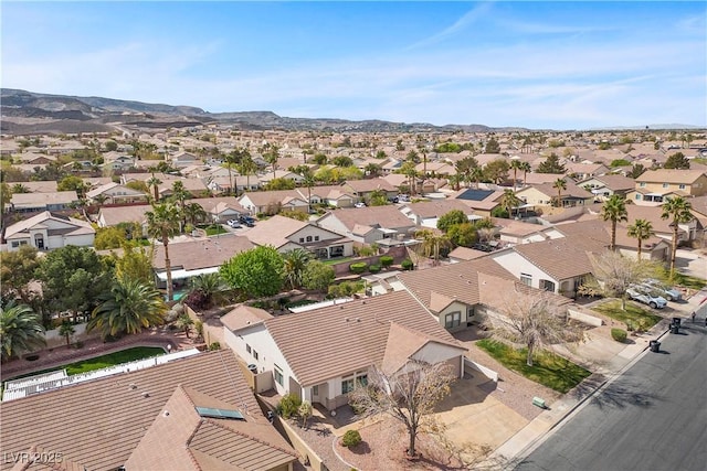 drone / aerial view with a mountain view and a residential view