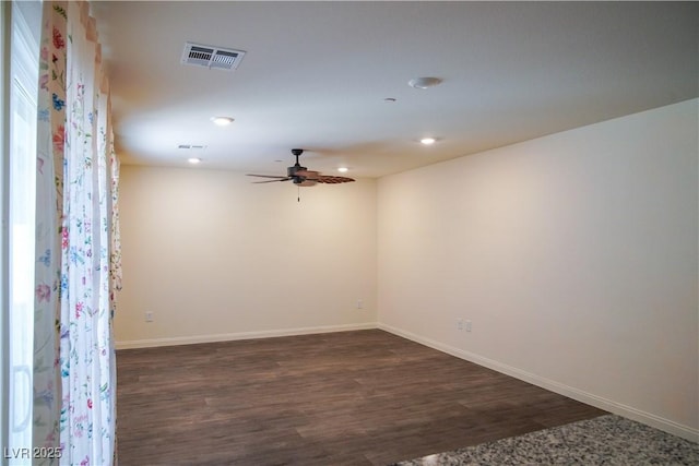 2765 Frosted Teal Ave, North Las Vegas, NV 89086 - empty room with a ceiling fan, dark wood-type flooring, baseboards, and recessed lighting