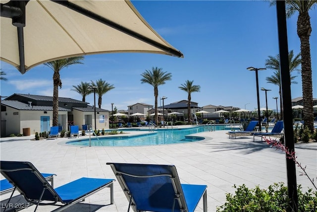 2765 Frosted Teal Ave, North Las Vegas, NV 89086 - community pool featuring a patio area and a residential view