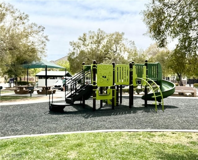 8477 Orly Ave, Las Vegas, NV 89143 - communal playground with a lawn