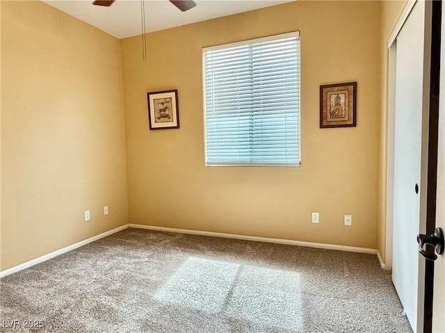 8477 Orly Ave, Las Vegas, NV 89143 - unfurnished room with carpet flooring, a ceiling fan, and baseboards