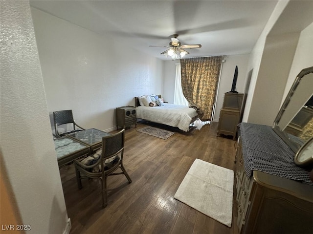 9126 Haddington Ln, Las Vegas, NV 89145 - bedroom with dark wood-style floors, ceiling fan, and baseboards