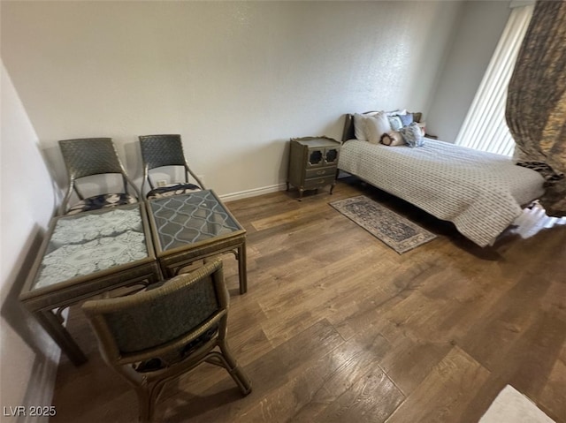 9126 Haddington Ln, Las Vegas, NV 89145 - bedroom with baseboards and wood finished floors