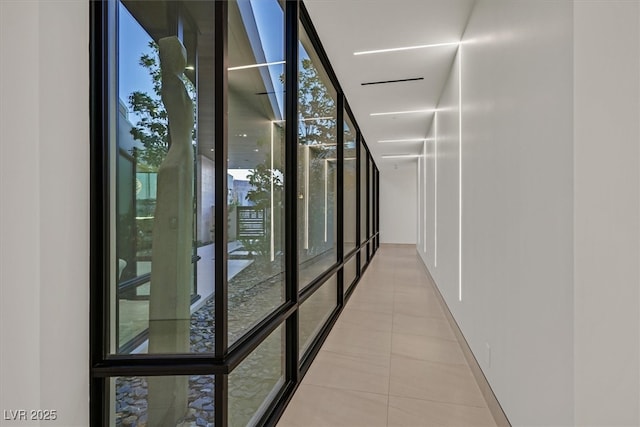corridor featuring tile patterned flooring