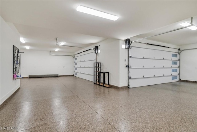 garage featuring baseboards