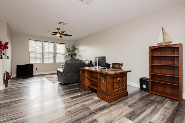 10091 Sand Key St, Las Vegas, NV 89178 - office area featuring wood finished floors, ceiling fan, and baseboards