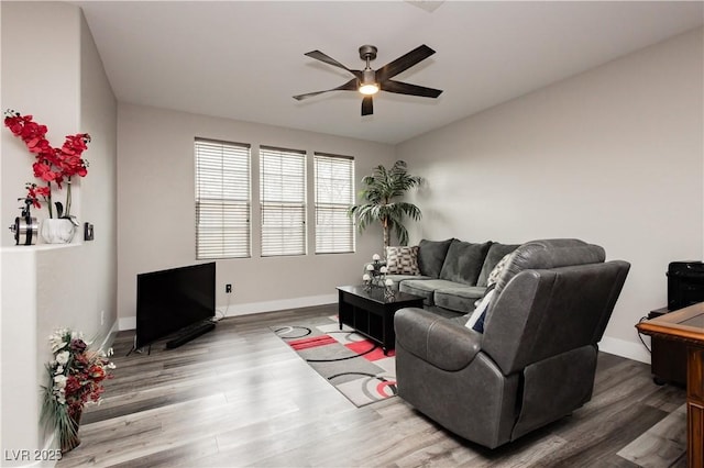 10091 Sand Key St, Las Vegas, NV 89178 - living room featuring ceiling fan, wood finished floors, and baseboards