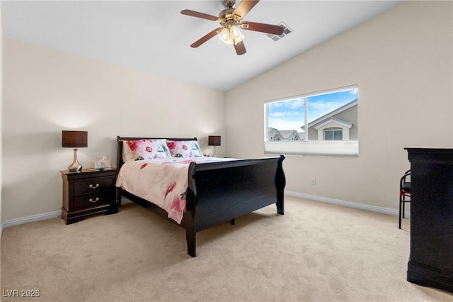 bedroom with visible vents, light colored carpet, baseboards, and lofted ceiling