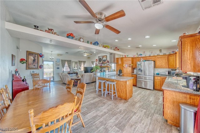 3424 Mount Charleston Dr, Pahrump, NV 89048 - dining space with a ceiling fan, light wood-type flooring, and recessed lighting