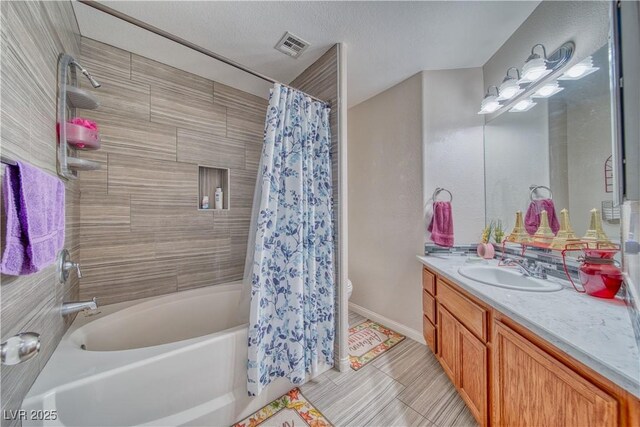3424 Mount Charleston Dr, Pahrump, NV 89048 - bathroom featuring vanity, shower / tub combo, toilet, baseboards, and tile patterned floors