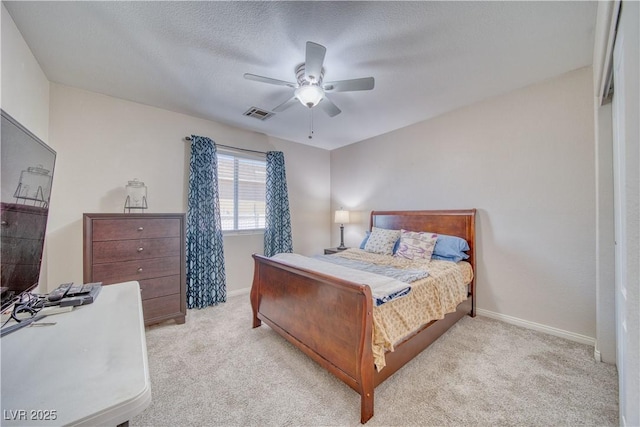 3424 Mount Charleston Dr, Pahrump, NV 89048 - bedroom featuring light colored carpet, baseboards, and a ceiling fan