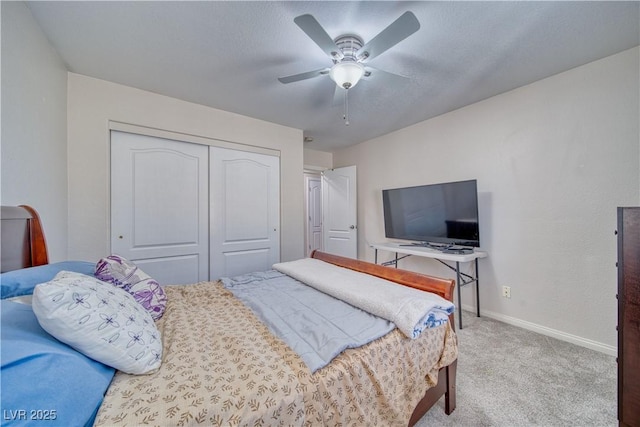 3424 Mount Charleston Dr, Pahrump, NV 89048 - carpeted bedroom with a closet, baseboards, and a ceiling fan