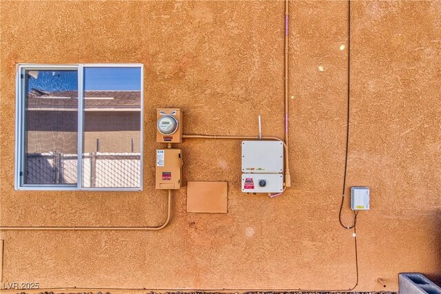 3424 Mount Charleston Dr, Pahrump, NV 89048 - exterior view of related energy utilities, stucco siding, and electric meter