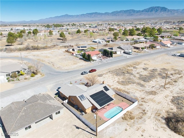 3424 Mount Charleston Dr, Pahrump, NV 89048 - aerial perspective of suburban area with a mountain backdrop and a desert landscape