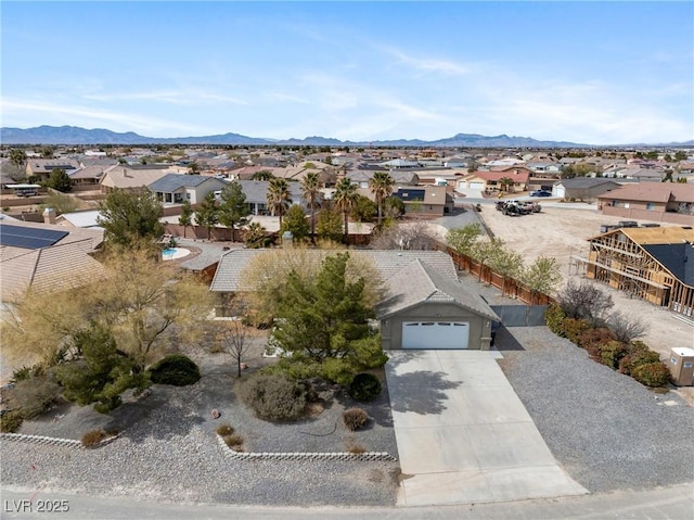 bird's eye view with a mountain view and a residential view