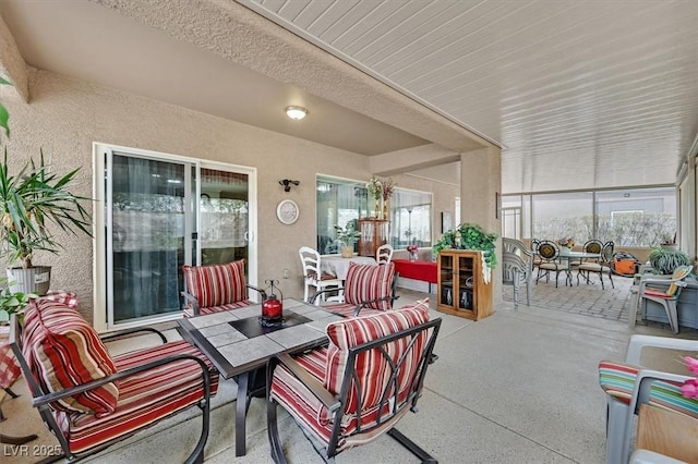 7741 Fruit Dove St, North Las Vegas, NV 89084 - view of patio with outdoor dining area and an outdoor hangout area