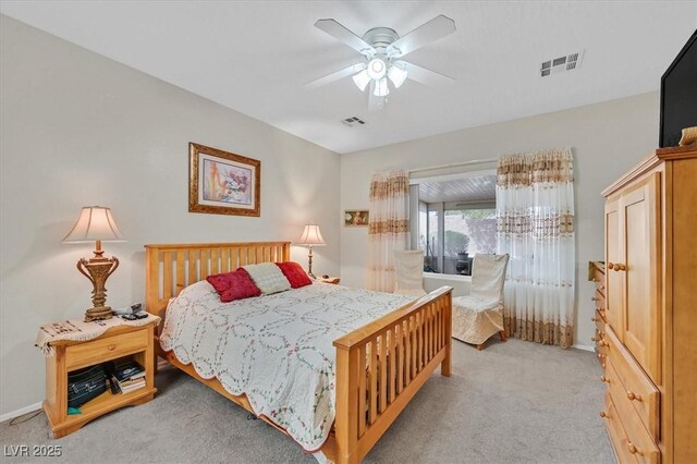 7741 Fruit Dove St, North Las Vegas, NV 89084 - bedroom featuring light carpet and ceiling fan