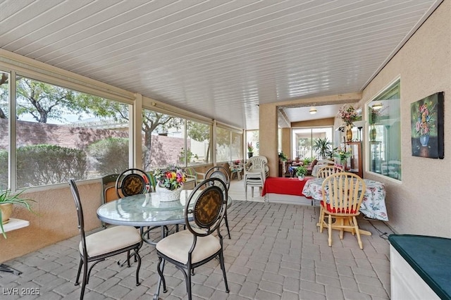 7741 Fruit Dove St, North Las Vegas, NV 89084 - sunroom featuring brick floors