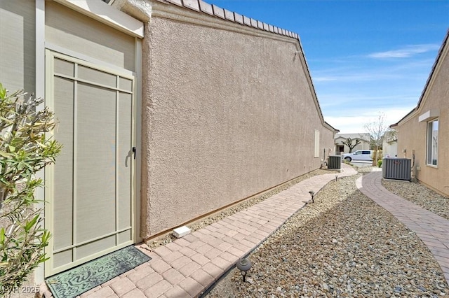 7741 Fruit Dove St, North Las Vegas, NV 89084 - view of home's exterior featuring central air condition unit and stucco siding