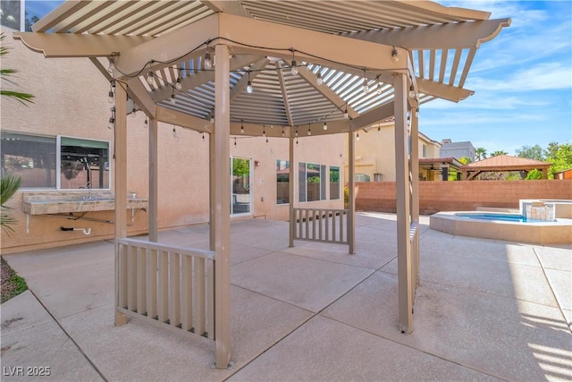 9967 Pipestone St, Las Vegas, NV 89141 - view of patio / terrace featuring a pergola and a pool with connected hot tub