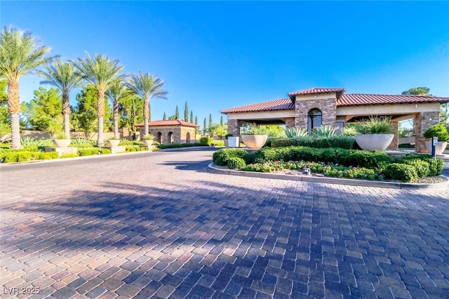 6923 Emerald Springs Ln, Las Vegas, NV 89113 - view of front of home with a tiled roof and stucco siding