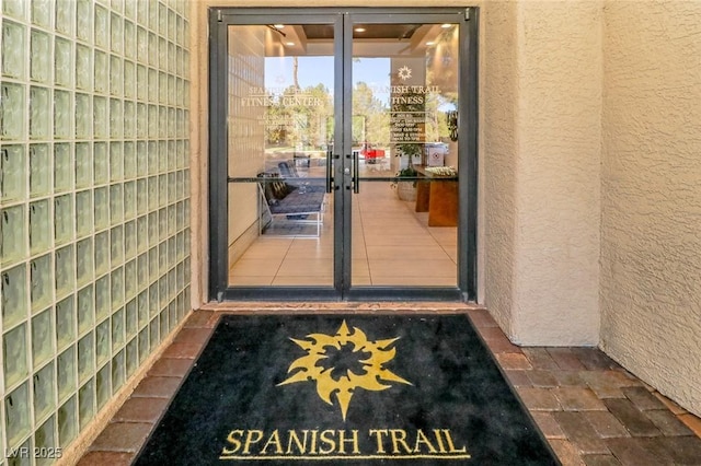 6923 Emerald Springs Ln, Las Vegas, NV 89113 - property entrance with french doors and stucco siding