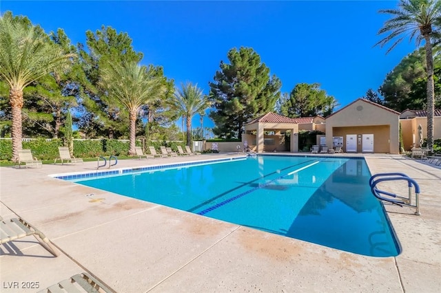 6923 Emerald Springs Ln, Las Vegas, NV 89113 - community pool with a patio