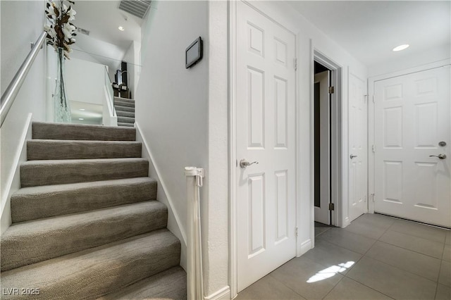 6923 Emerald Springs Ln, Las Vegas, NV 89113 - stairs featuring tile patterned flooring
