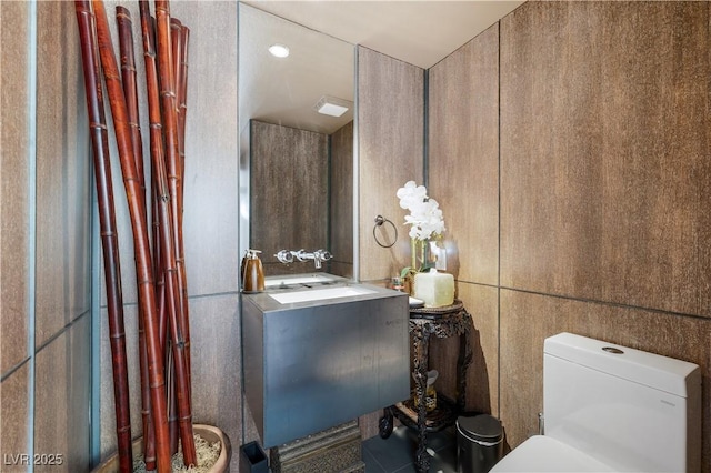 6923 Emerald Springs Ln, Las Vegas, NV 89113 - half bathroom featuring toilet and vanity