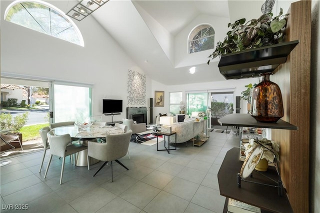 6923 Emerald Springs Ln, Las Vegas, NV 89113 - dining area with high vaulted ceiling, plenty of natural light, and tile patterned flooring