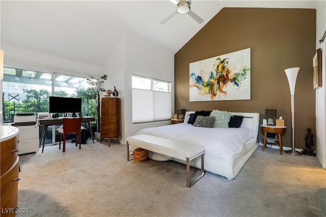 6923 Emerald Springs Ln, Las Vegas, NV 89113 - bedroom with multiple windows, high vaulted ceiling, an office area, light colored carpet, and a ceiling fan