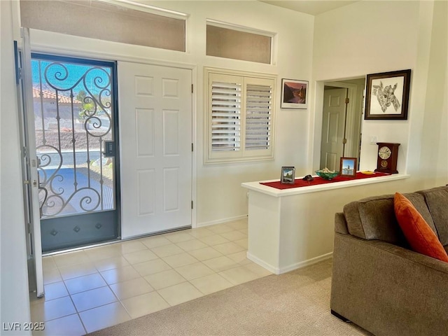 2736 Darby Falls Dr, Las Vegas, NV 89134 - foyer featuring light tile patterned floors and baseboards