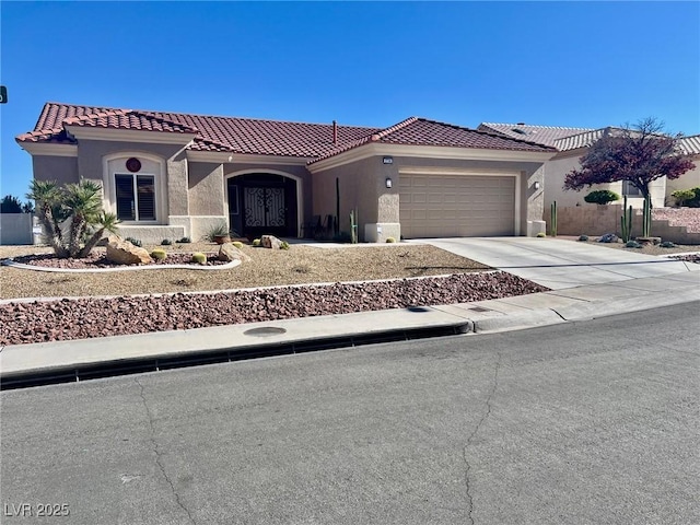2736 Darby Falls Dr, Las Vegas, NV 89134 - mediterranean / spanish-style house featuring a tiled roof, stucco siding, an attached garage, and concrete driveway