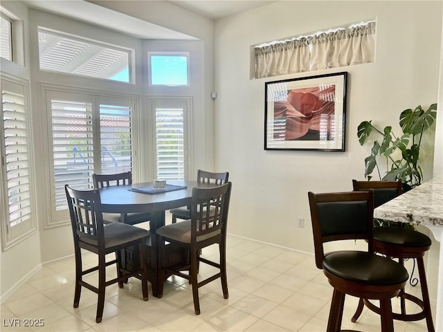 2736 Darby Falls Dr, Las Vegas, NV 89134 - dining room with baseboards