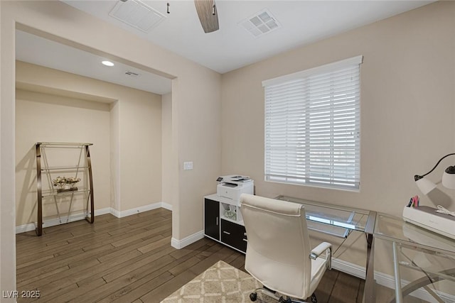 office featuring wood finished floors, recessed lighting, baseboards, and visible vents