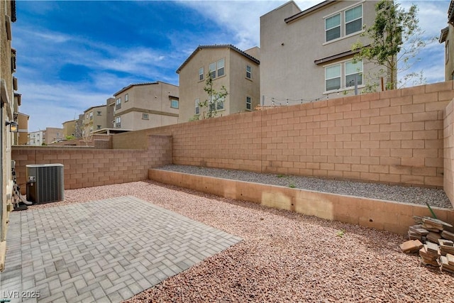 105 Campbelltown Ave, Henderson, NV 89015 - view of patio / terrace with central air condition unit, a fenced backyard, and a residential view